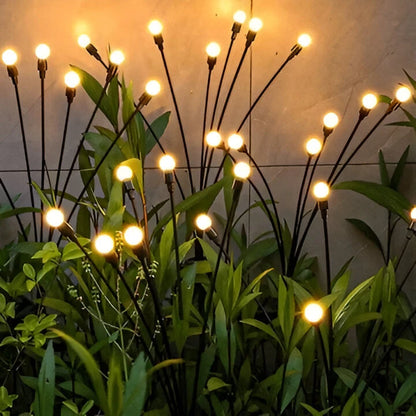 Solar Garden Lights with Flickering Firefly Glow and Flexible Stakes, Warm White Zolana